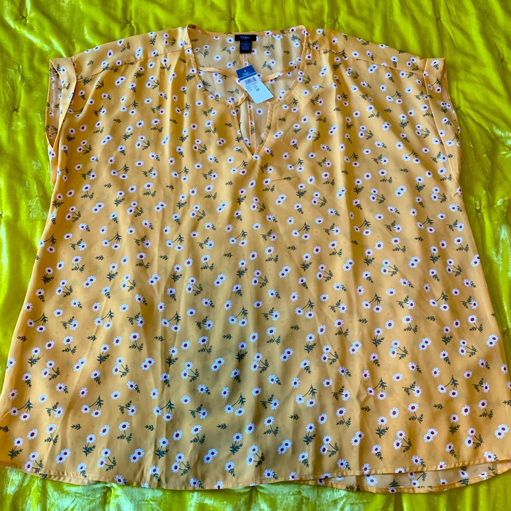 Rue + yellow sleeveless blouse with white flowers. Cut out at neck & cuffs 3X